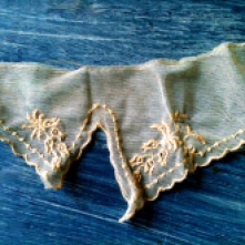 A beautiful lace collar -- I have much trouble throwing out antique textiles...